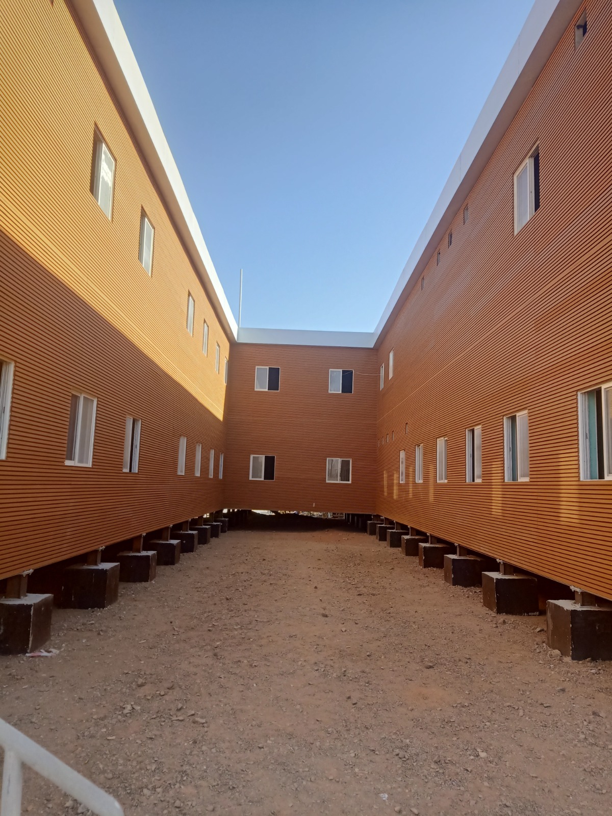Building exterior with horizontal wall cladding and windows