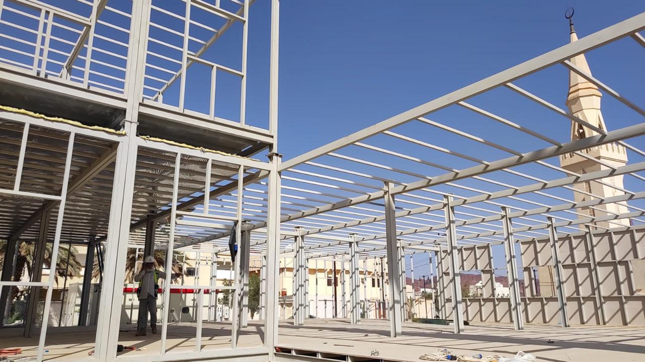 Steel columns and beams forming a building framework